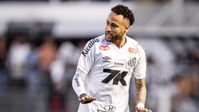 Neymar em jogo do Santos, sinalizando para ter calma