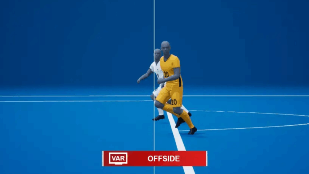 Impedimento semiautomático sendo executado, com o atacante a frente do defensor