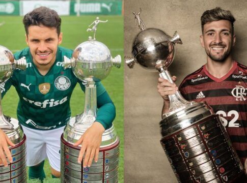 Em uma foto, Raphael Veiga, do Palmeiras, posa ao lado de duas taças da Libertadores, na outra, Arrascaeta, do Flamengo, segura o troféu da competição