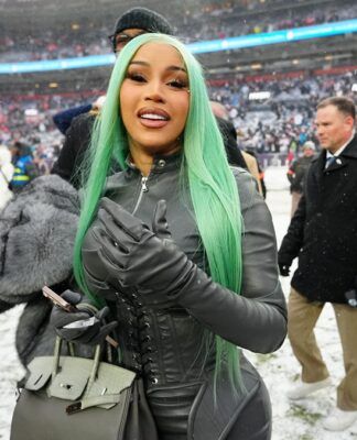 A cantora Cardi B após uma partida do Campeonato da AFC de 2026 de futebol americano, em janeiro (Foto: Ron Chenoy/Imagn Images/Reuters)