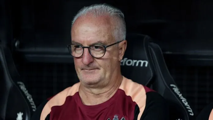 Dorival Júnior sentado no banco de reservas do Corinthians durante jogo