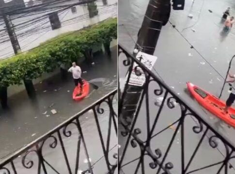 Homem pratica stand-up paddle em rua alagada de Fortaleza; veja vídeo